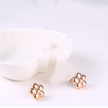A Pair of Rose Gold Earrings